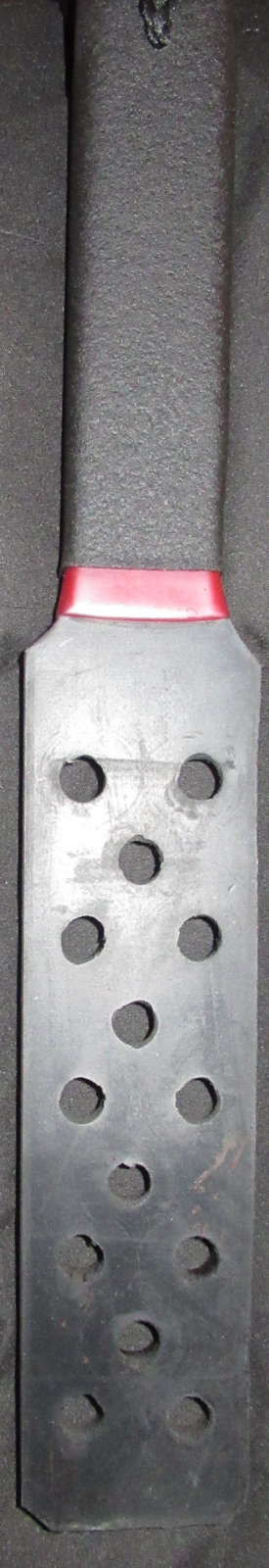 rubber sp;anking paddle with holes