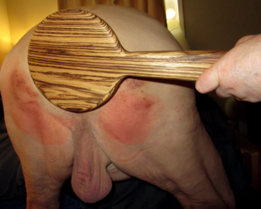 large sporkwood paddle on lion's ass
